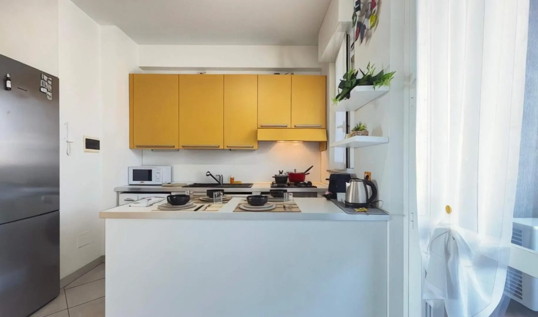 Homeby, Casa Cartesio Milan